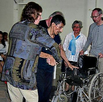 Jesus Heals The Sick. This man,paralyzed for years, got out of his wheelchair and walked!